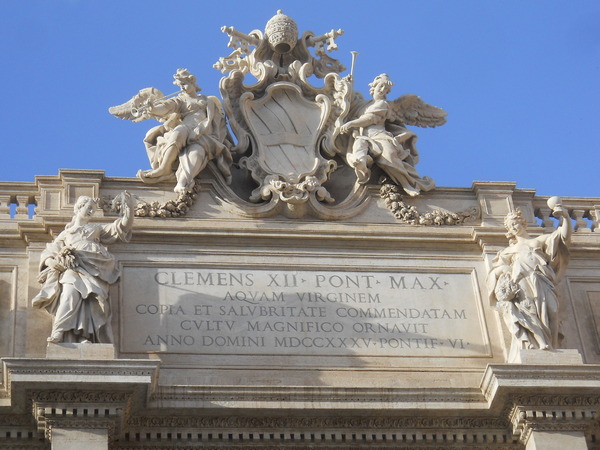 top crest of Trevi fountain in Rome