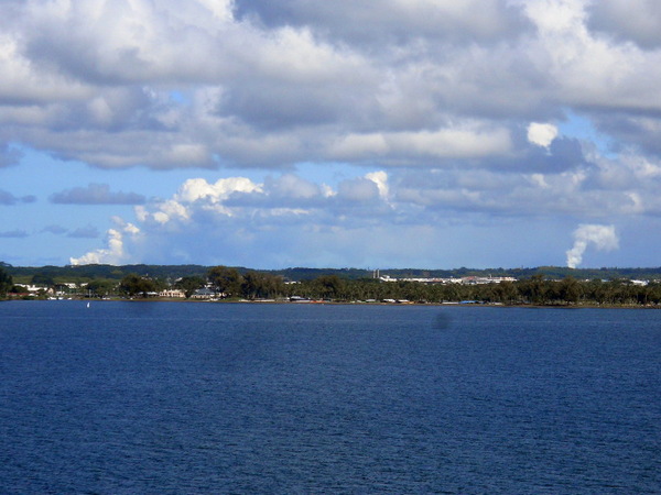 looking at smoke rising from the lava flow across Hilo Bay