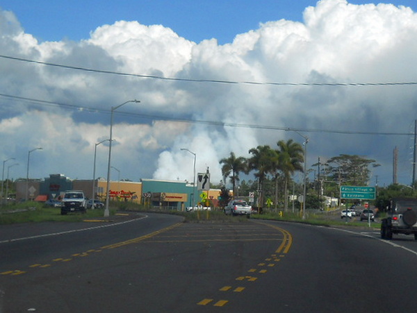 looking at smoke rising from Fissure 8 in the distance behind Longs Drugs Pahoa