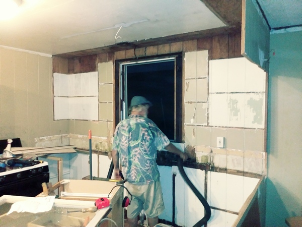 working on kitchen walls