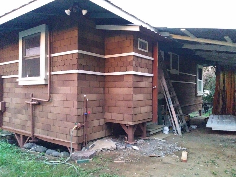 niche with four walls and some shingles and the roof