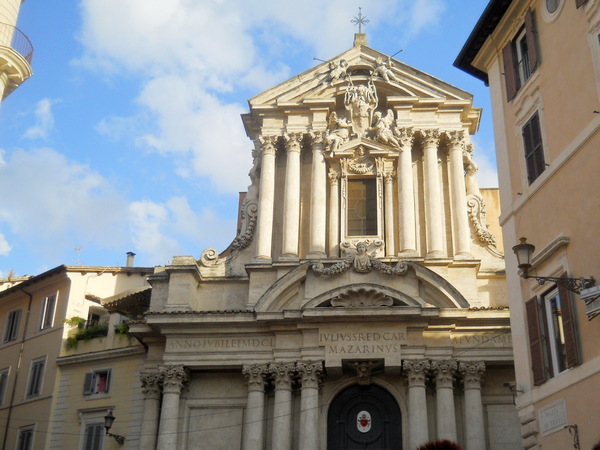 building behind the folks looking at the trevi fountain