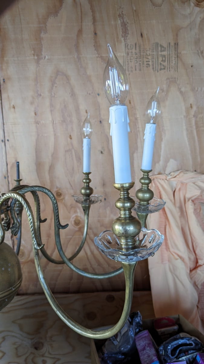lamp arms being assembled