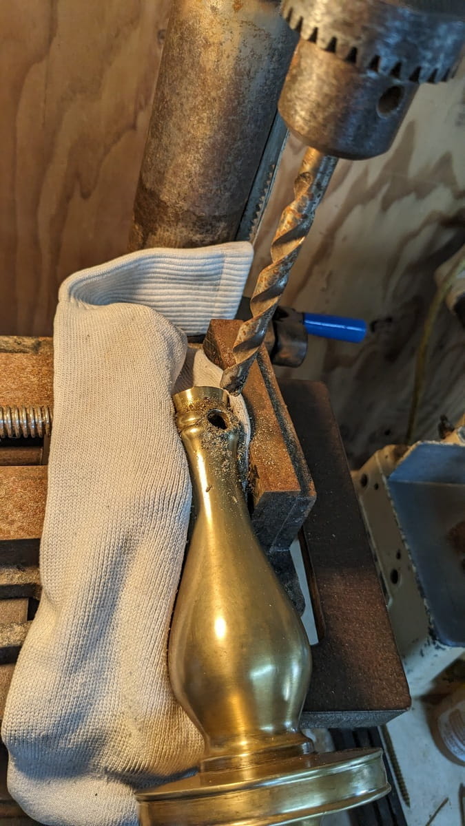 top of chandelier body in drill press