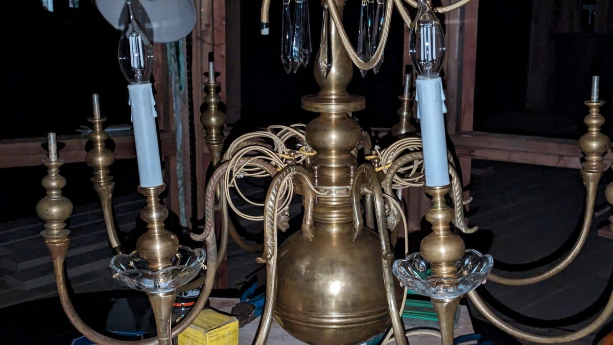 closer up of chandelier body with arms added