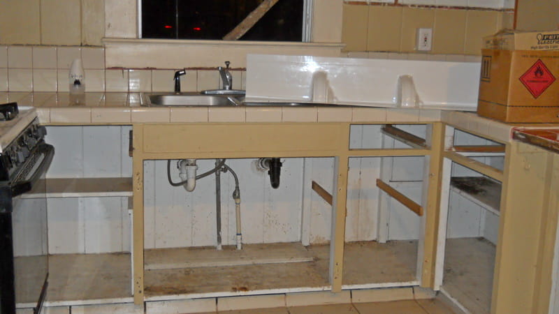 kitchen sink counter with no drawers or doors